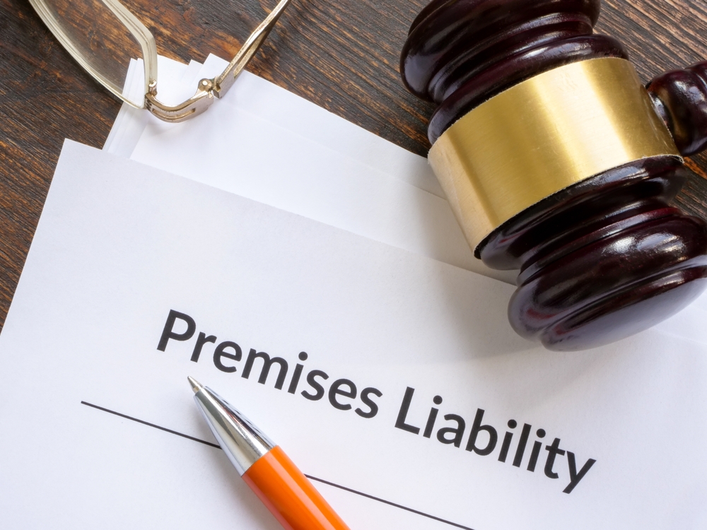 Richardson premises liability lawyer reviewing a premises liability claim and legal documents.