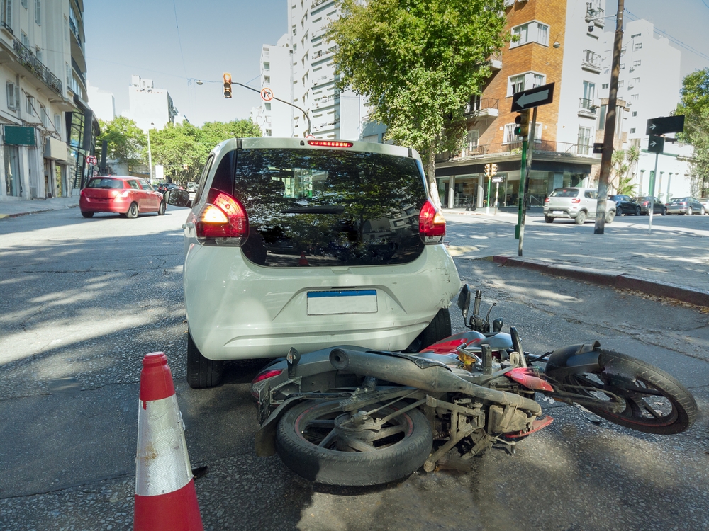 Motorcycle crash behind vehicle handled by a Dallas motorcycle accident lawyer overcoming the bias