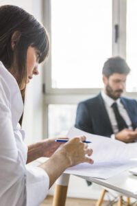 Premises liability lawyer in Fort Worth reviewing legal documents in an office setting